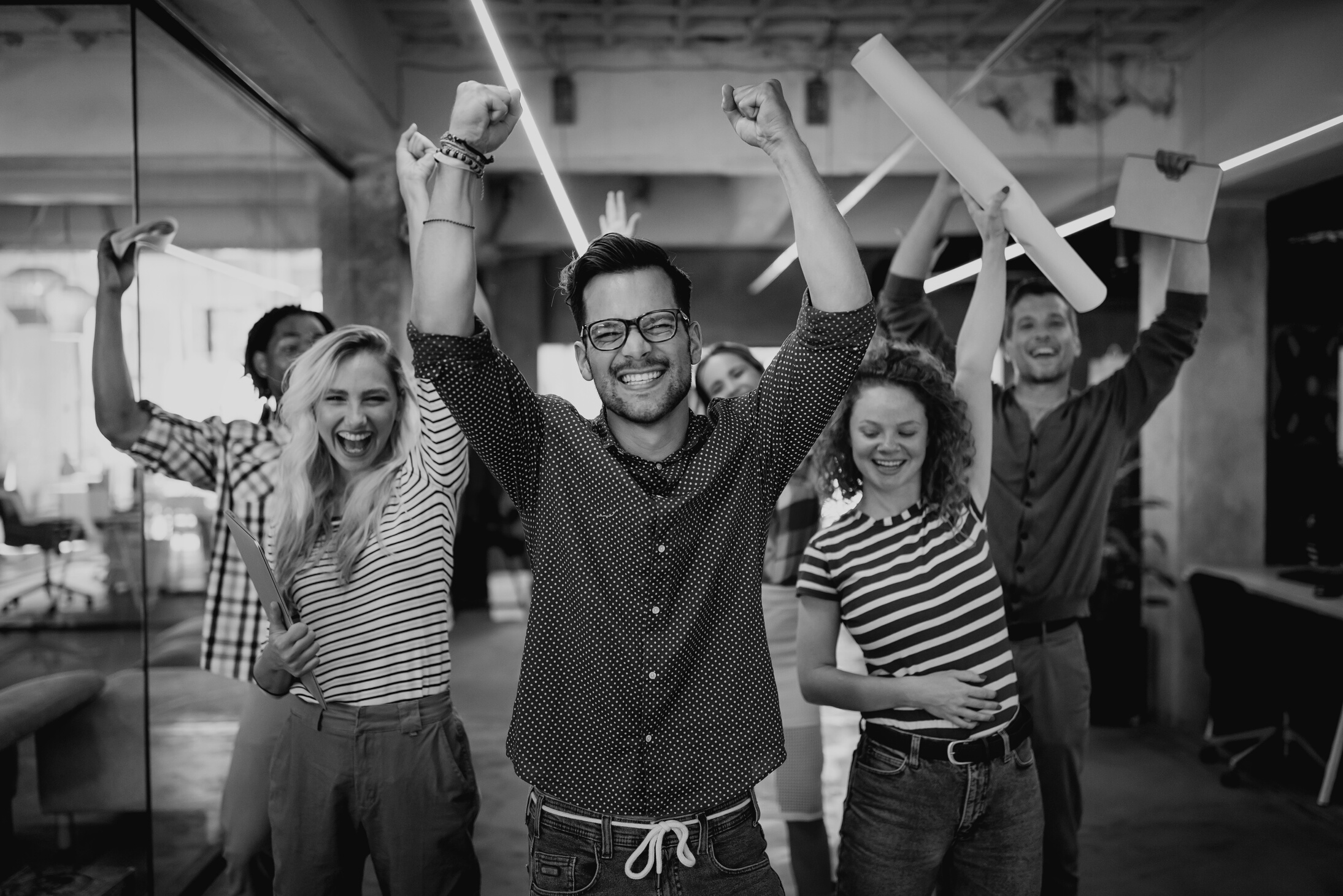 Successful company with happy employees in modern office